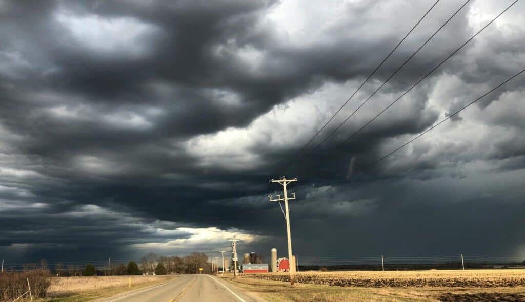 Stormy skies over a Midwest landscape conveys the tone of the blog post titled "Surviving Life's Storms" by Robert N. Lauderdale.