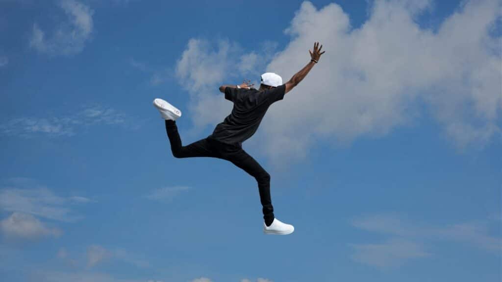Man taking leap of faith without a safety net